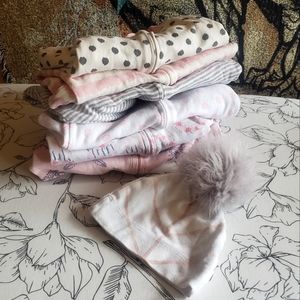 Lot of baby girl zippered play and sleep onsies + cute hat with faux fur pom